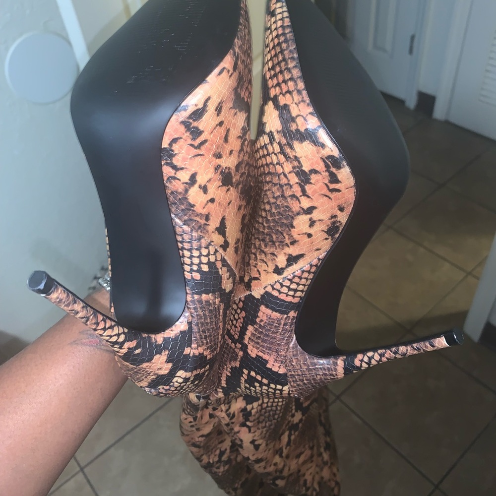 Extreme thigh high snake skin boots…